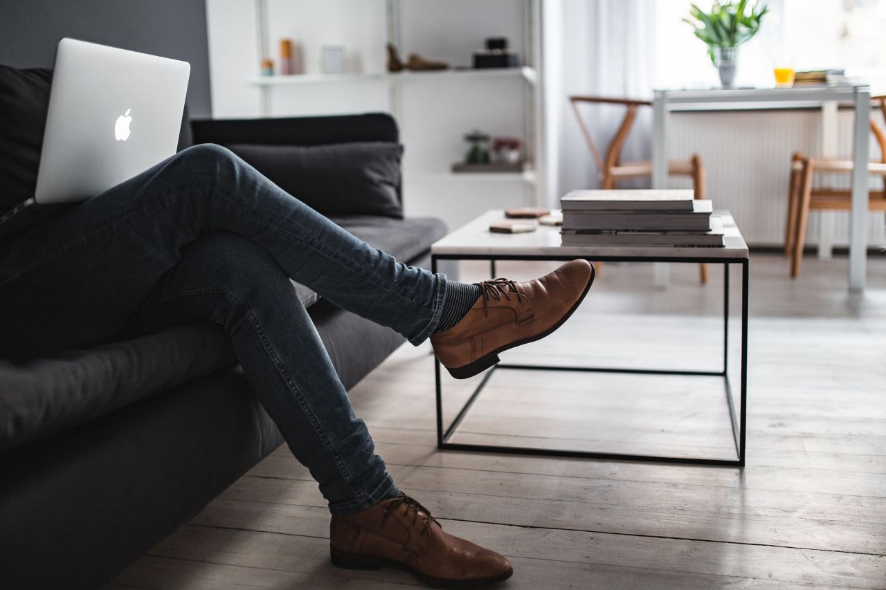 kaboompics_Man Working in Scandi Apartment